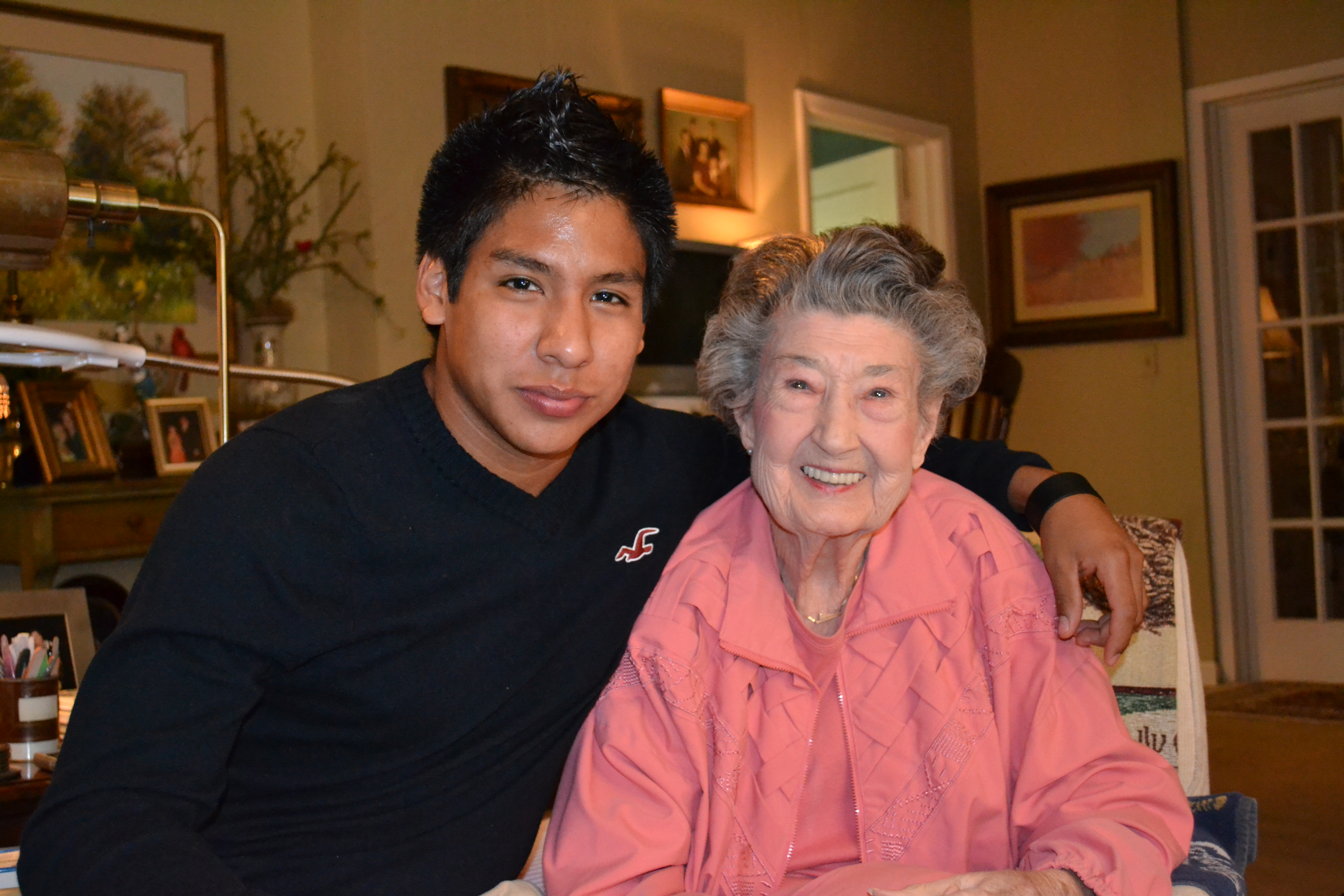 PHOTO:  John Torres visits with Mrs. JoBeth Janoush.